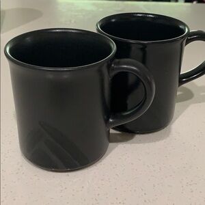 Black mugs with design